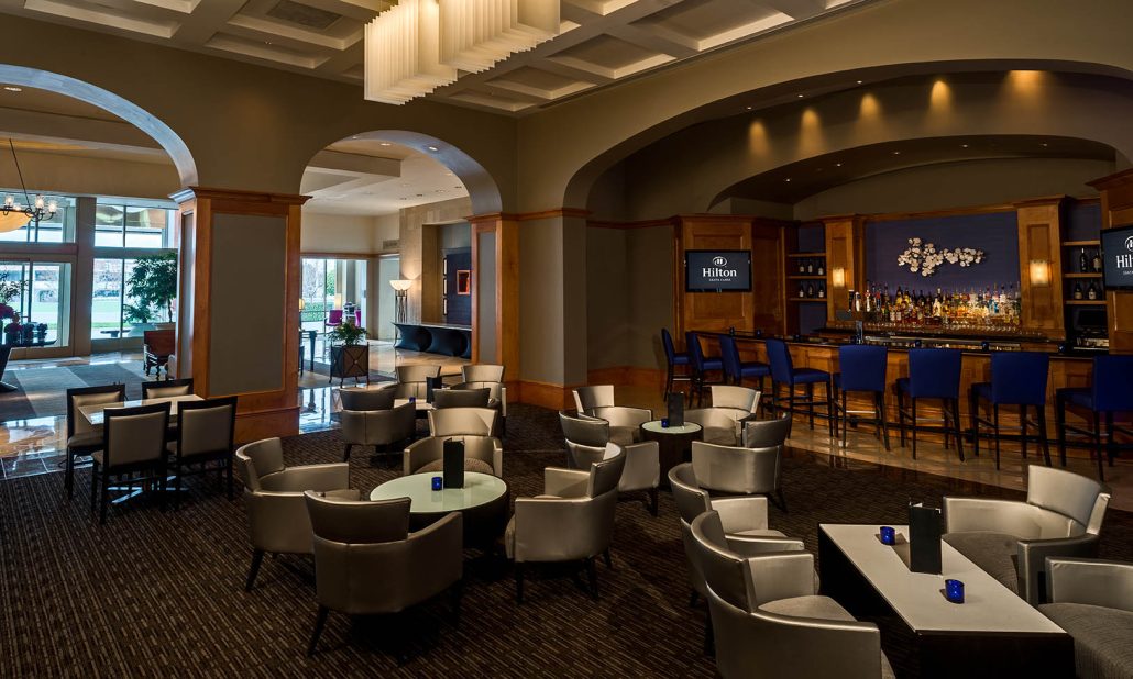 La Fontana Lounge at Hilton Santa Clara featuring modern seating and a full-service bar