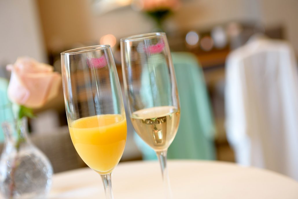 Champagne and orange juice toast at Hilton Santa Clara, part of custom wedding packages at this Santa Clara wedding venue.