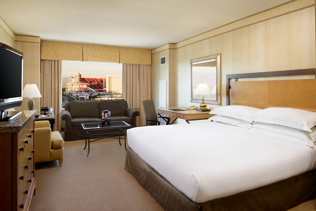 Spacious king room with sofa bed and Levi’s Stadium view at Hilton Santa Clara, part of Santa Clara hotel room tours.
