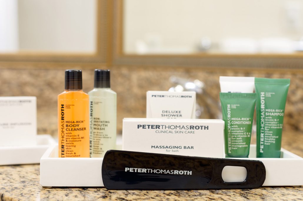 In-room amenities at Hilton Santa Clara for wedding guests, featuring luxury toiletries and thoughtful touches.